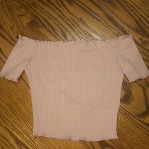 This is a settle pink off-the-shoulder top